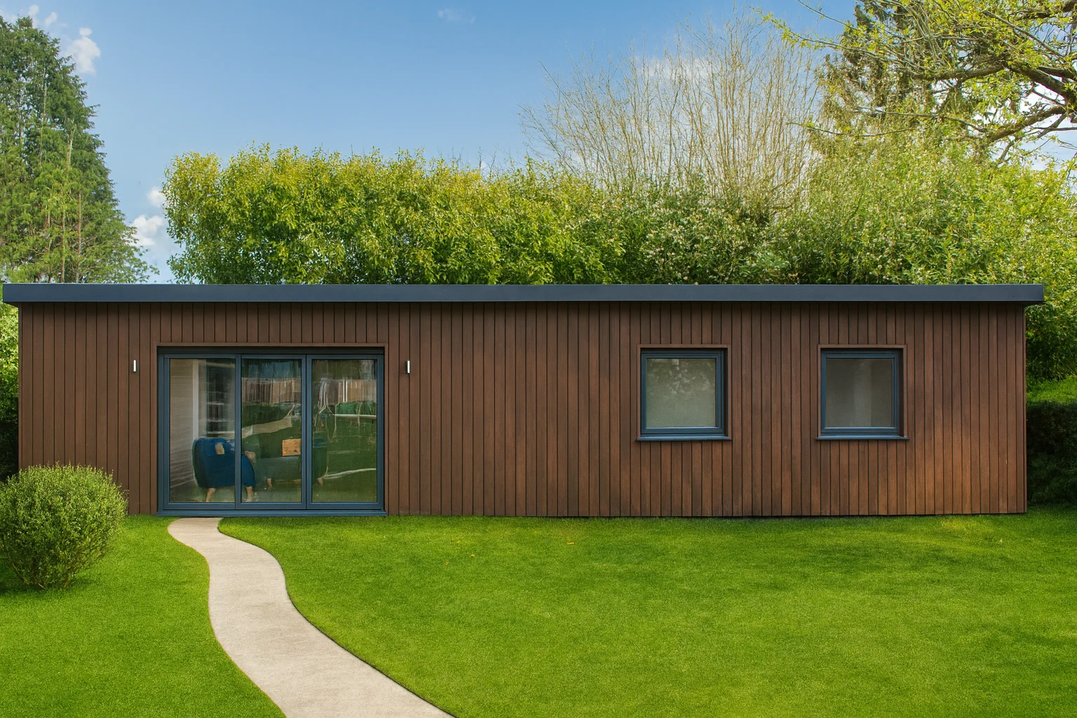 Turnkey garden annexe installation with stylish exterior and garden views
