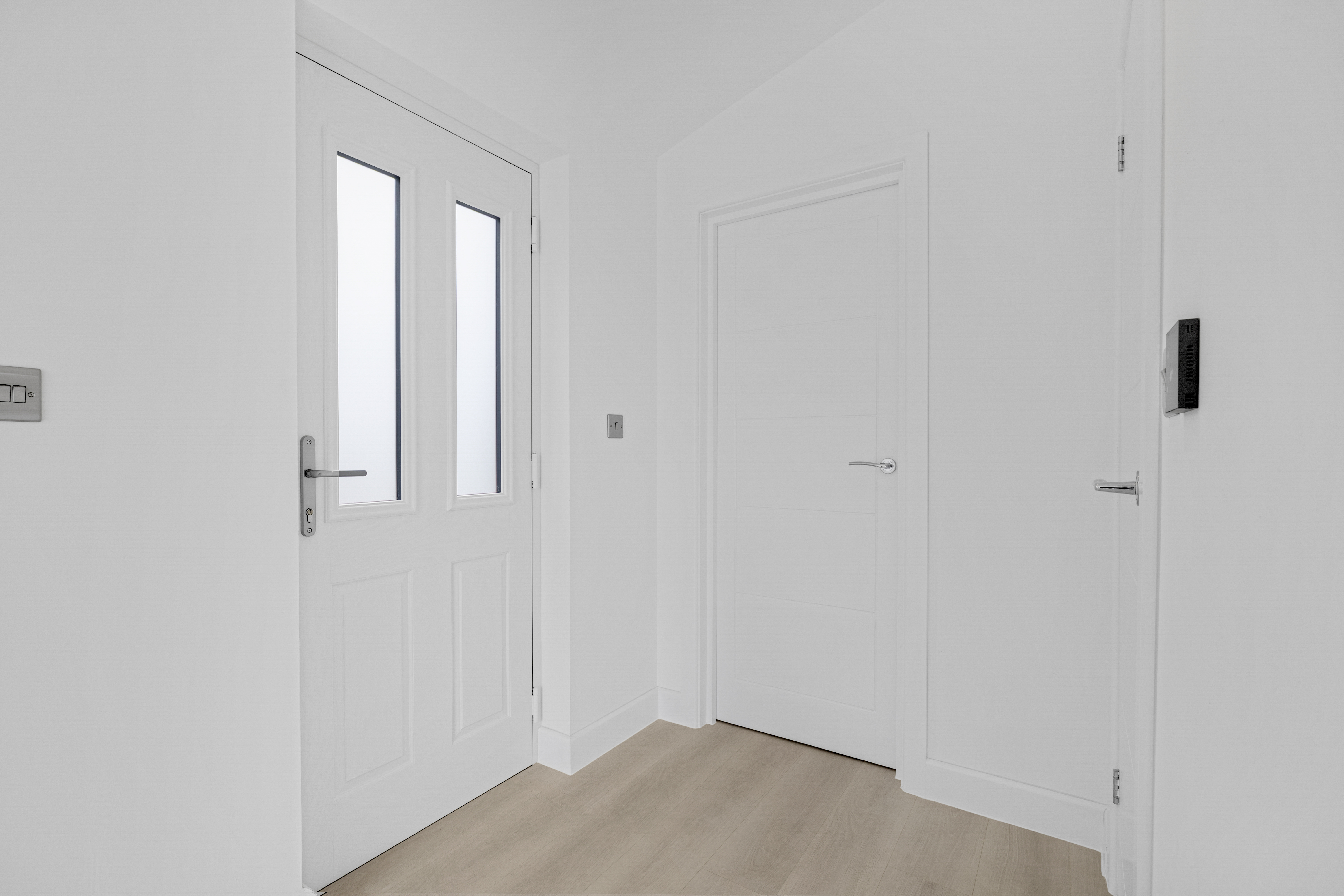 Bespoke garden annexe Interior Design with modern appliances and clean worktops