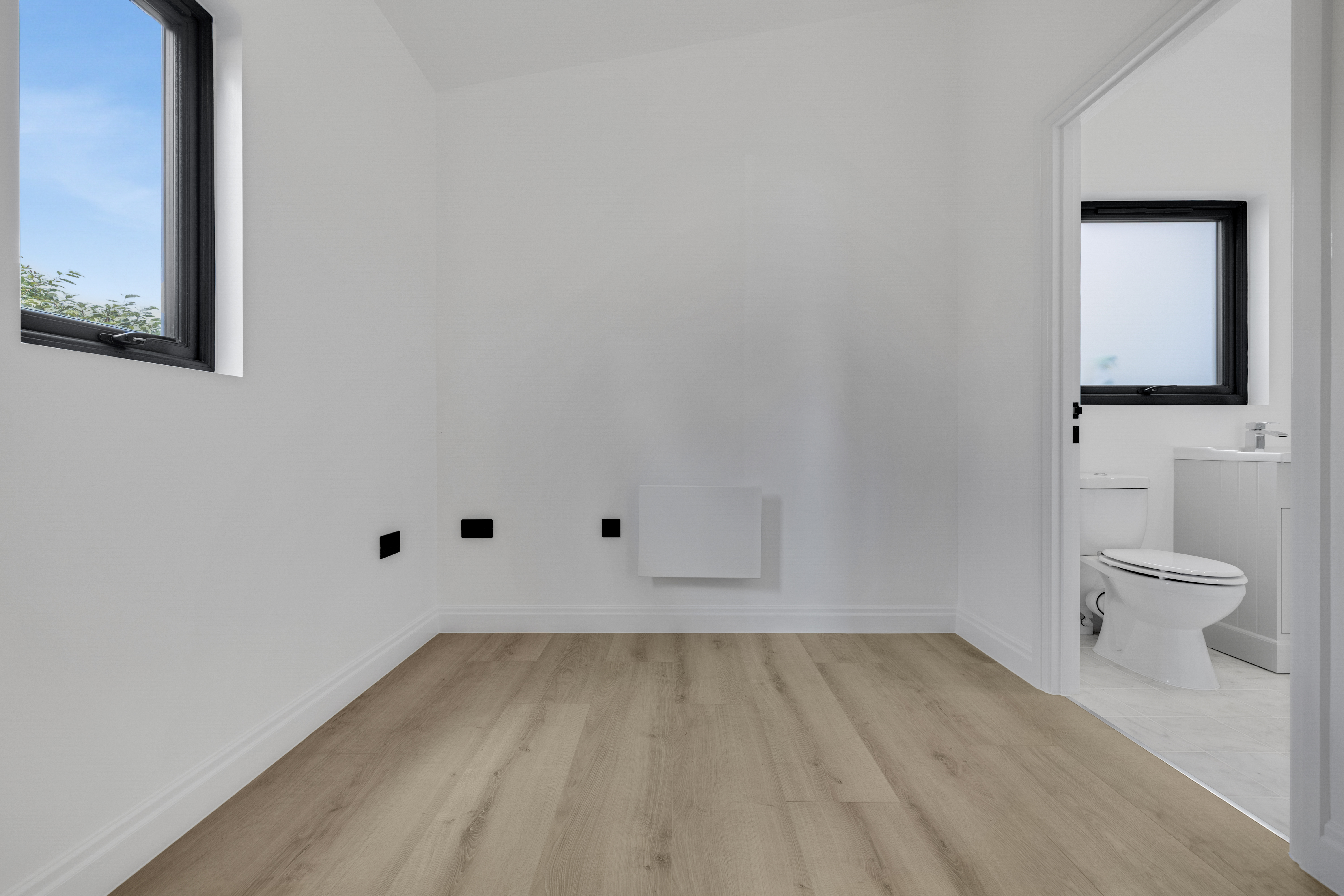Bespoke garden annexe Interior Design with modern appliances and clean worktops