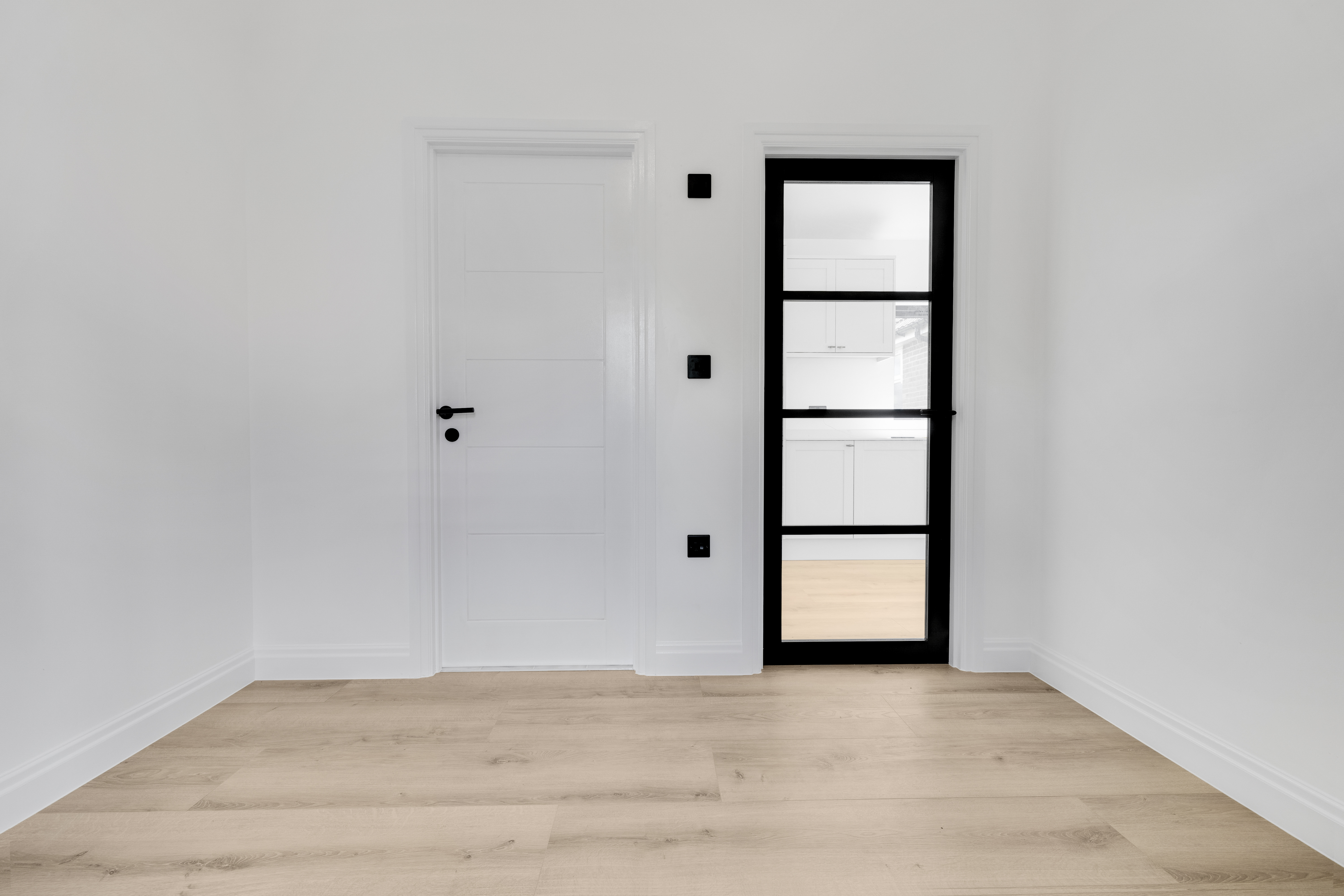 Bespoke garden annexe Interior Design with modern appliances and clean worktops