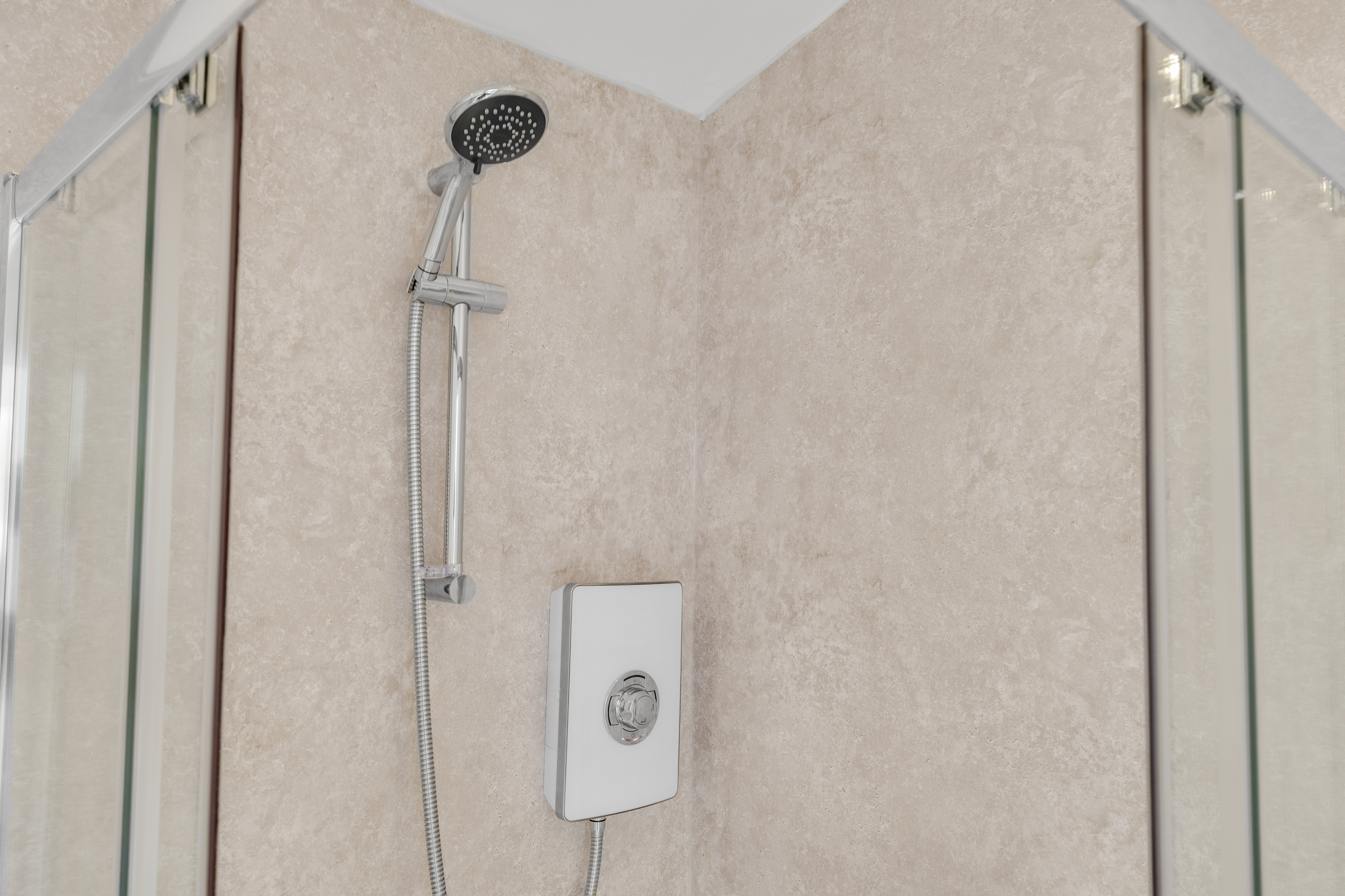 Bespoke garden annexe Washroom Design with modern appliances and clean worktops
