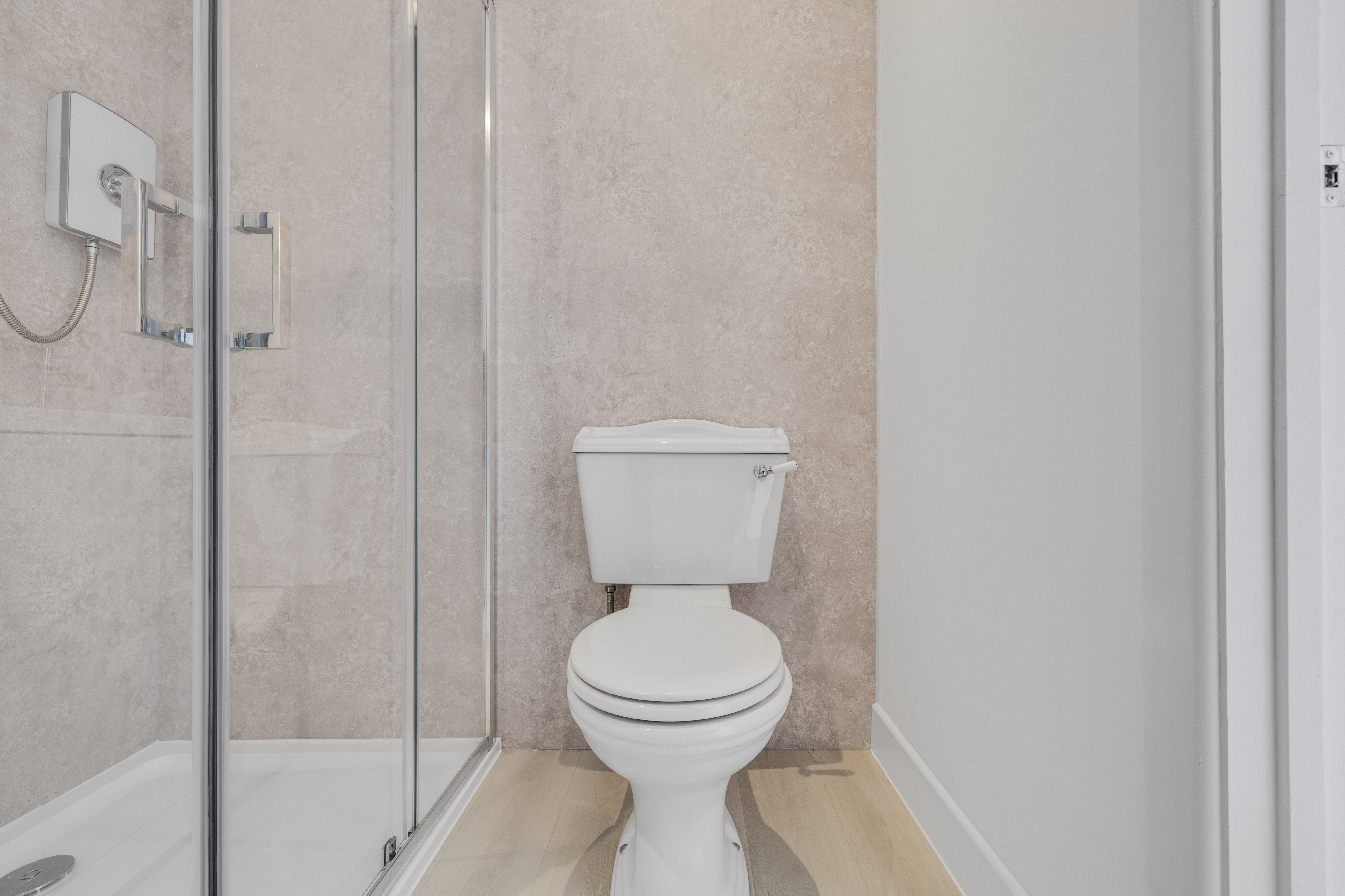 Bespoke garden annexe Washroom Design with modern appliances and clean worktops