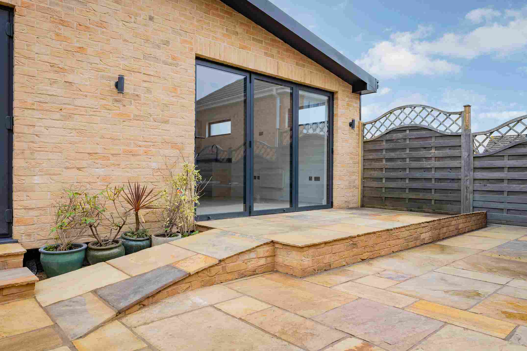 Luxury granny annexe living room with contemporary furniture and bright finish