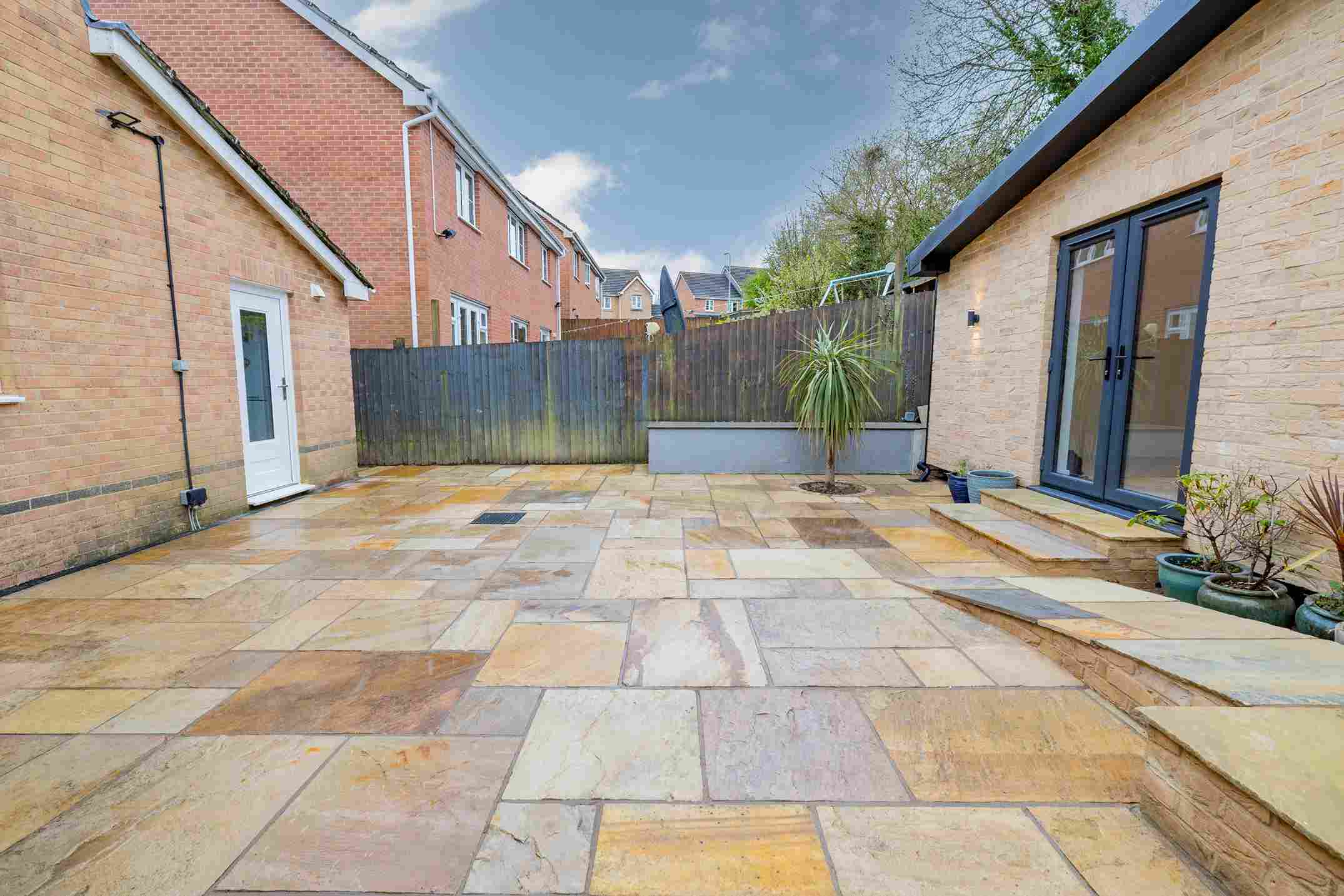 Premium granny annexe interior with open plan lounge and kitchen area