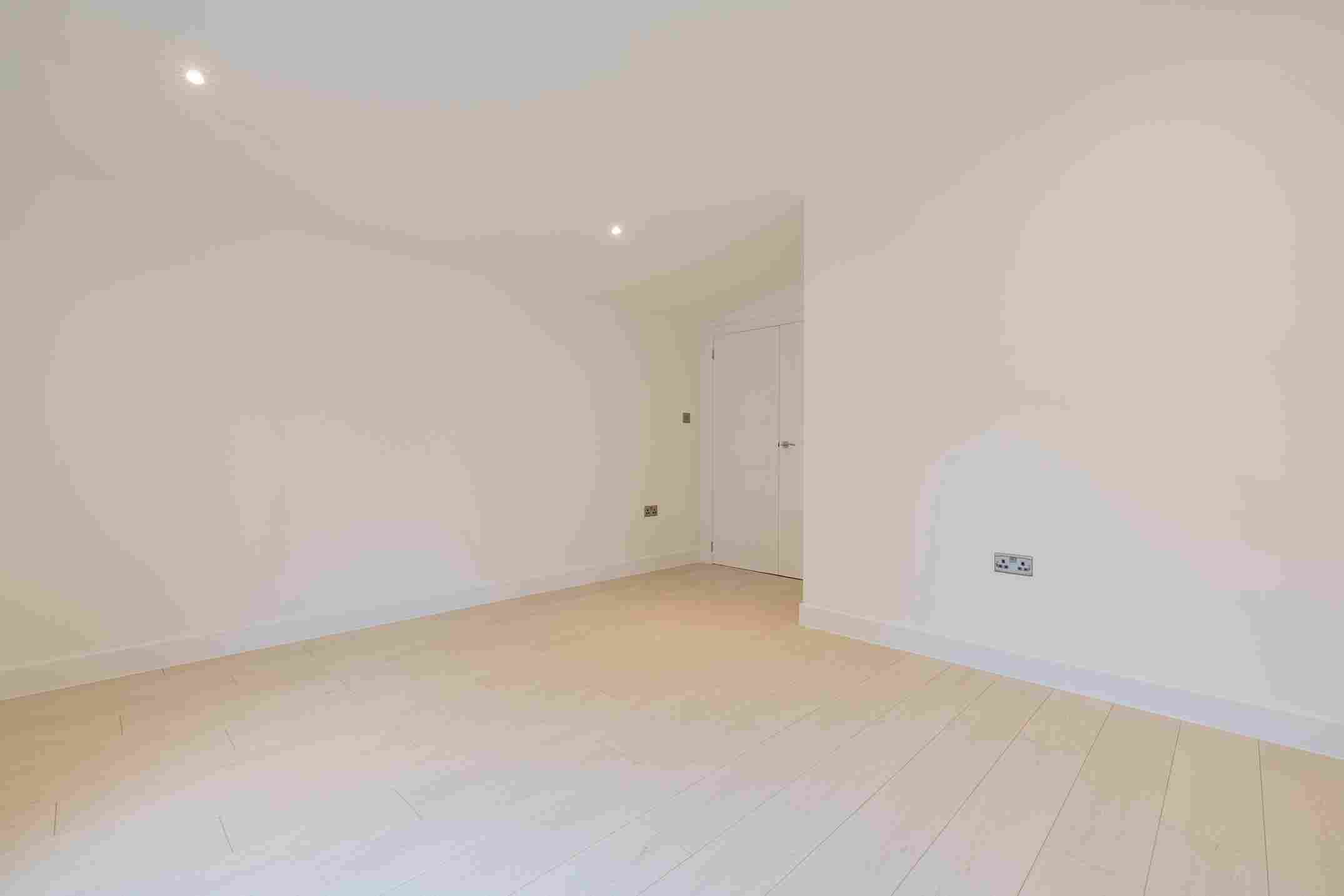 Luxury annexe bathroom with walk in shower and premium tiled finish